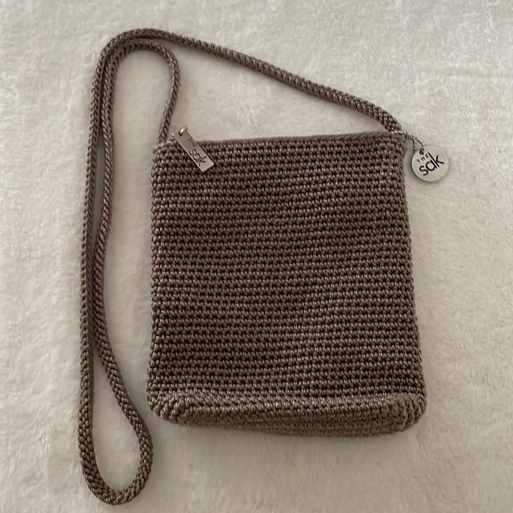 The Sak Shoulder/Crossbody Mini bag.  Approximately 19” Strap, 7”x 6.75” x 1.75”